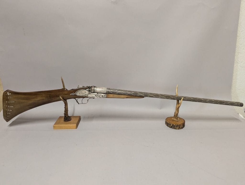 Fusil de chasse
Jean-Julien GRÜNWEISER (1890, Nancy - 1961) (graveur) ; manufacture nationale d'Armes de
Saint-Etienne (fabricant), 1936
Château-Musée, musée de la Chasse, Gien, inv. 2017.13.3
Crédits : Fusil Grünweiser – Legs Nègre à la ville de Gien, château-musée de Gien : chasse,
histoire et nature en Val de Loire. © David MASSOL-MOULHI.